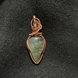 Hand crafted copper pendant.
